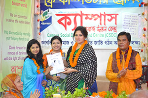 Chief Service Officer of Airtel, Rubaba Dowla is giving Certificates to the Trainees of Free Computer Training (Batch 130) as Chief Guest; Dr. M Helal presides over. (2014)